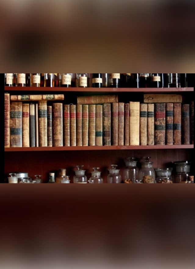 Frame 1618873882 A bookshelf with many books on it